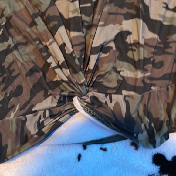 a camouflage and black and white striped shirt - Picture 3 of 3